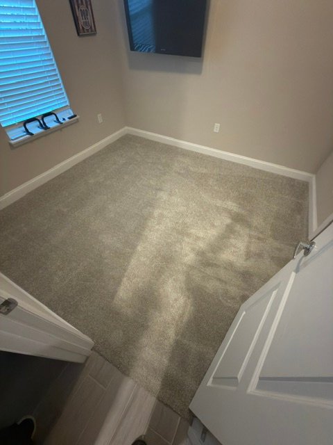 Completed carpet installation in Bartram Park Jacksonville townhouse bedroom
