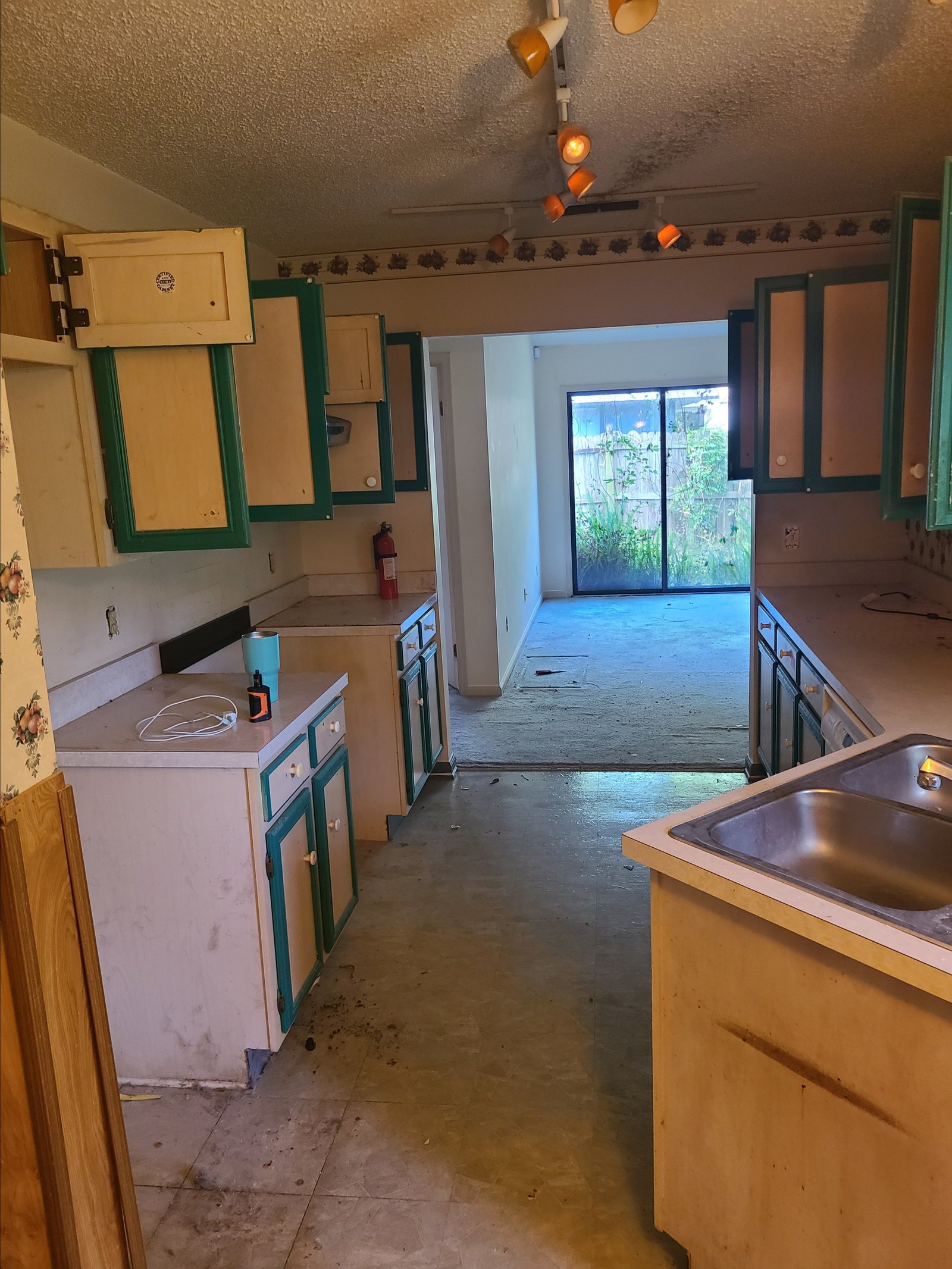 Kitchen before luxury vinyl plank flooring installation in Mandarin Jacksonville FL