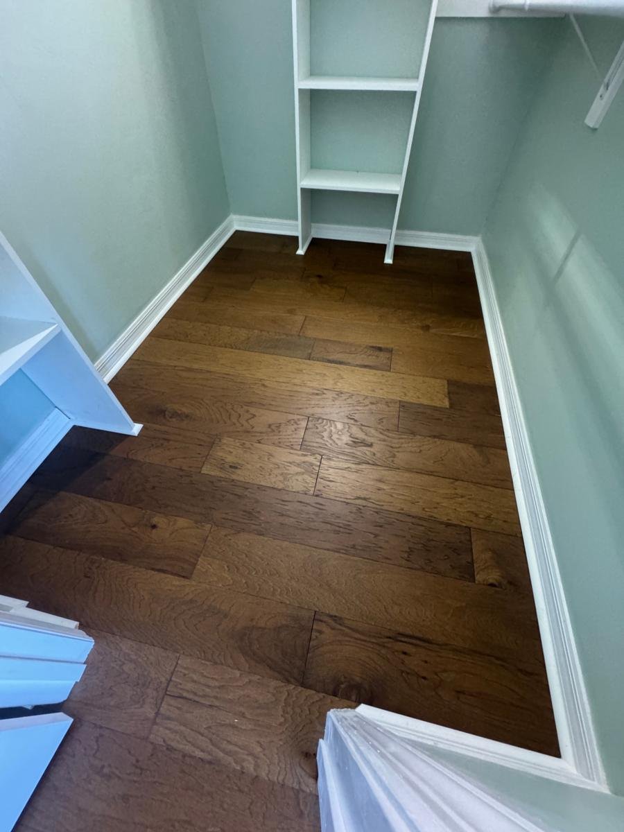 Hardwood flooring carried into a walk-in closet in Arlington, Jacksonville