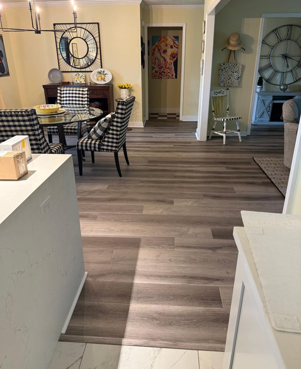 New luxury vinyl plank meeting the existing kitchen tile in a Mandarin, Jacksonville home