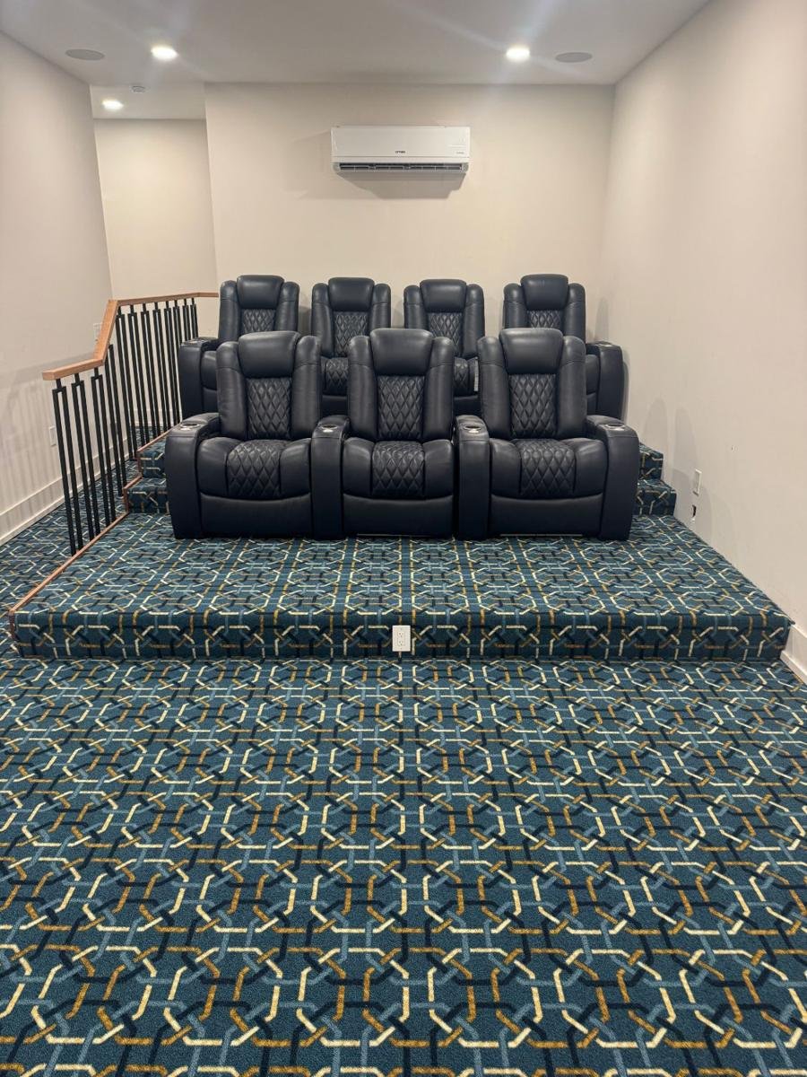 Patterned carpet installed on a tiered home theater floor in Fleming Island, FL