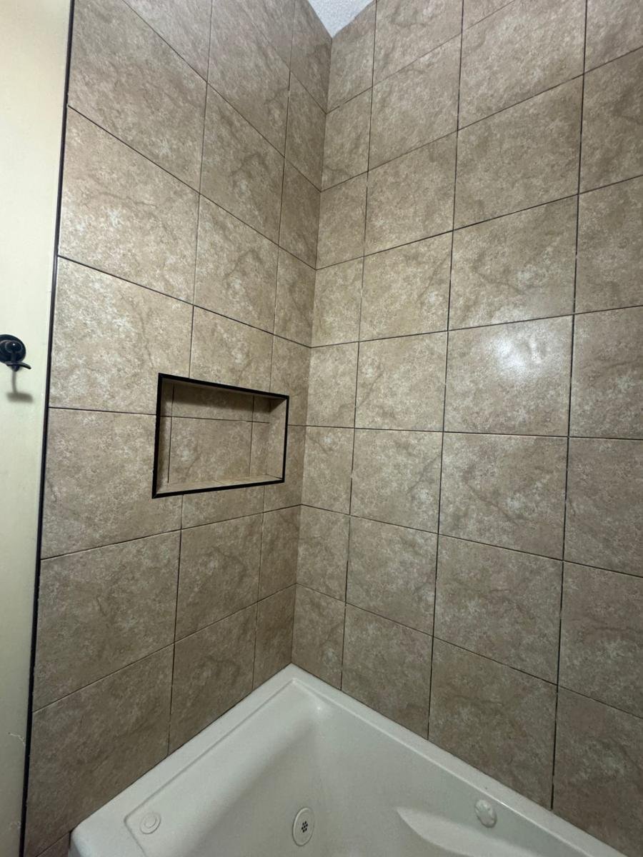 New tile tub surround with recessed niche in Mandarin, Jacksonville